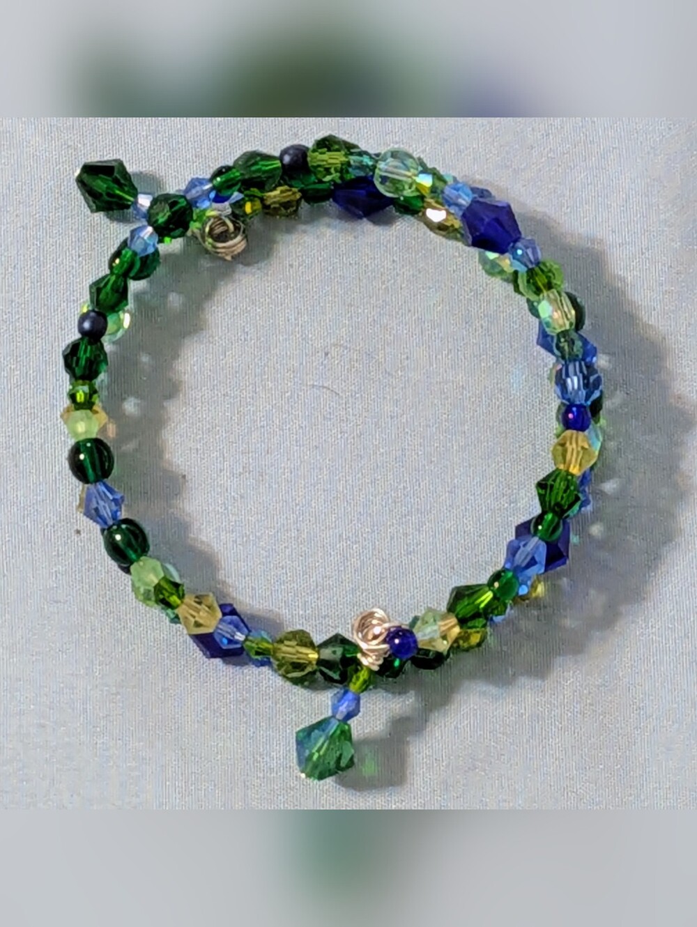 Earth Element Inspired Memory Wire Bracelet with Greens, Blues, Yellow Crystals